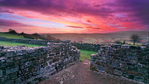 A vibrant sunset over Hadrian's Wall at Banks East Turret